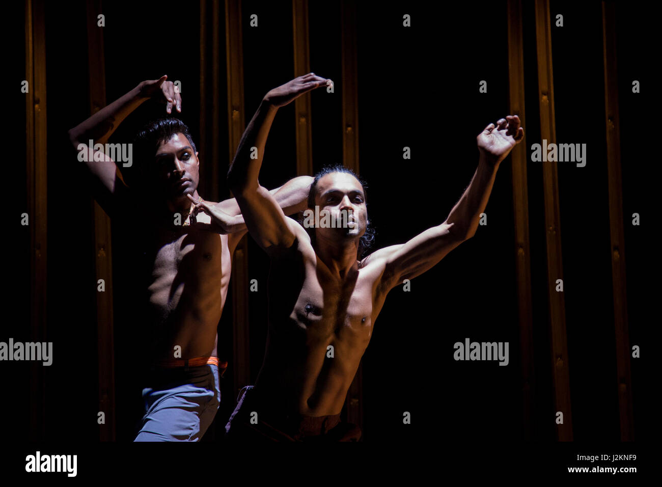 London, UK. 28 April 2017. L-R: Sooraj Subramaniam, Shailesh Bahoran. Photocall for Material Men redux by Shobana Jeyasingh Dance at The Place in Euston. The two dancers Sooraj Subramaniam and Shailesh Bahoran explore the violence of loss and the creation of new ways of belonging using their contrasting dance styles - classical Indian dance and hip hop - choreographed by Shobana Jeyasingh. Stock Photo