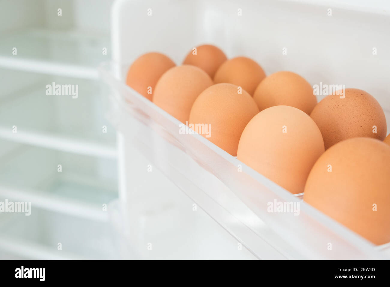 Eggs in a fridge door, Shortage Stock Photo Alamy