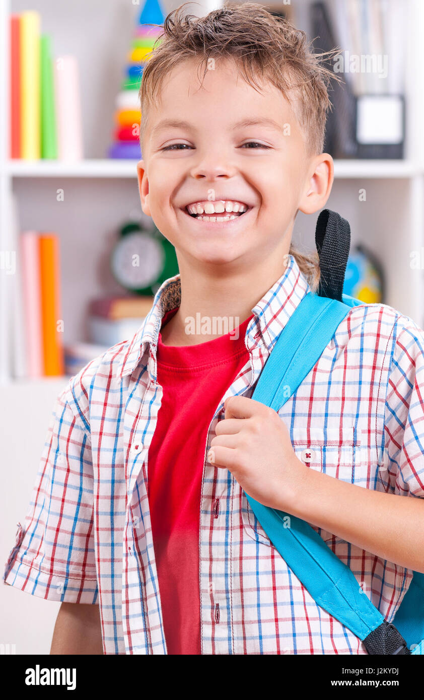 Boy with school bag Stock Photo Alamy