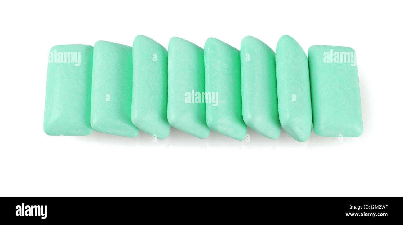 Row of Green Chewing Gums on White Background Stock Photo