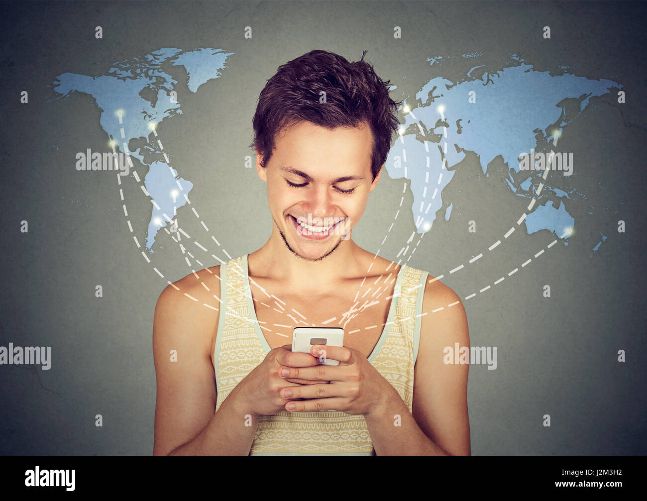 Modern communication technology mobile phone high tech, web connection concept. Happy man holding smartphone connected browsing internet worldwide wor Stock Photo