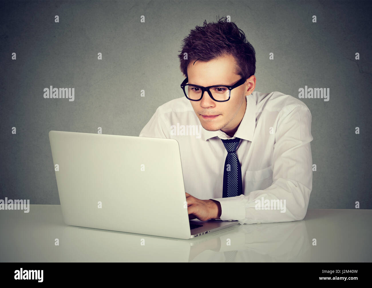 Man using his laptop computer Stock Photo