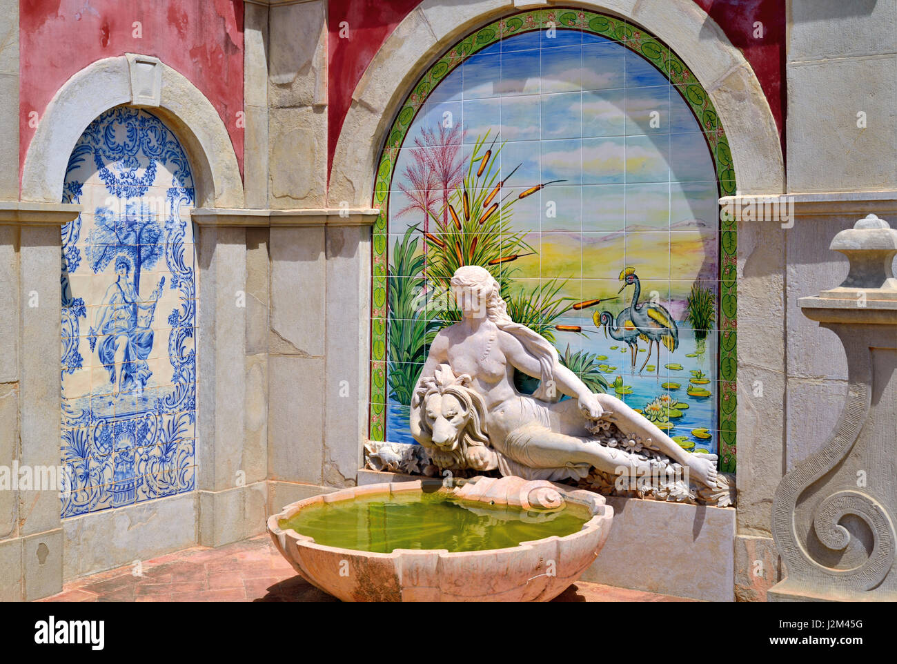 Portugal, Algarve: Mythologic figure with romantic tiles at park of Estói Palace Stock Photo