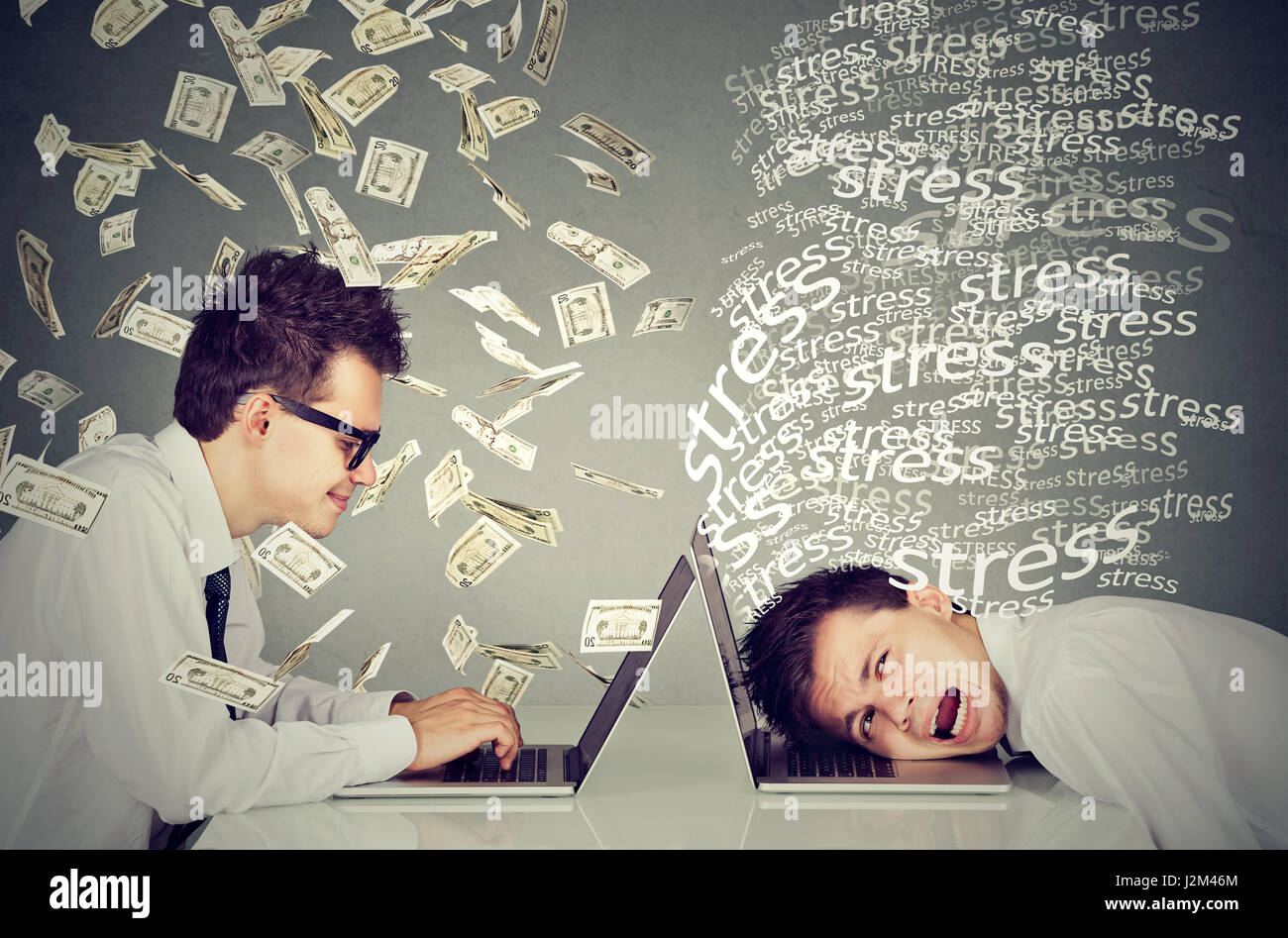 Corporate employee income compensation economy concept. Stressed desperate man working on laptop sitting next to young professional man under money do Stock Photo