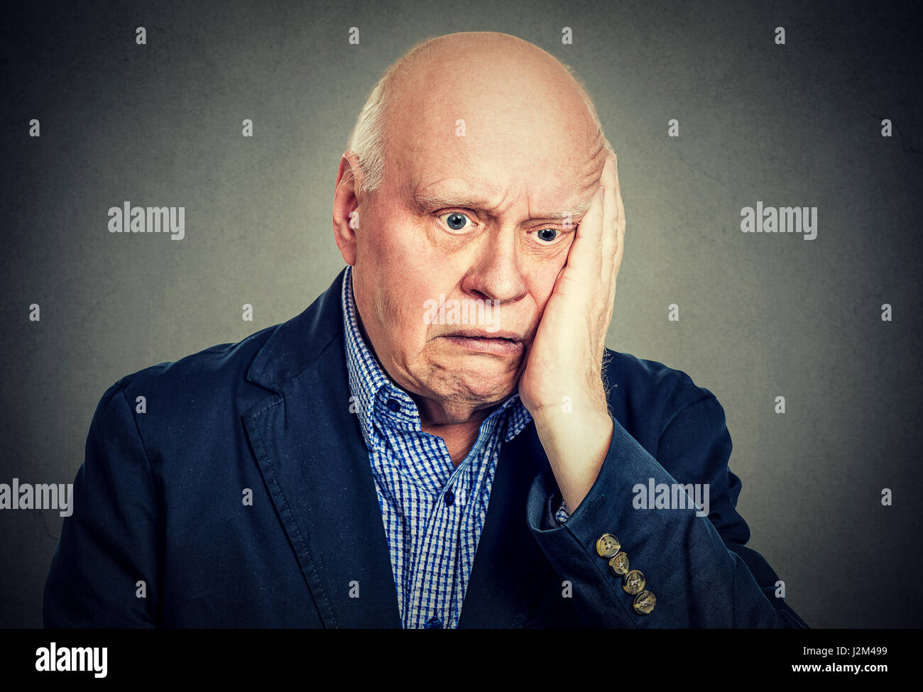 portrait of elderly desperate sad man Stock Photo