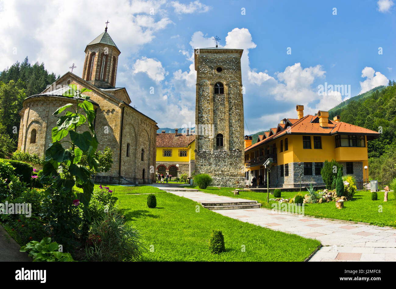 Church yard inside 13th century Rača monastery walls, west Serbia Stock Photo