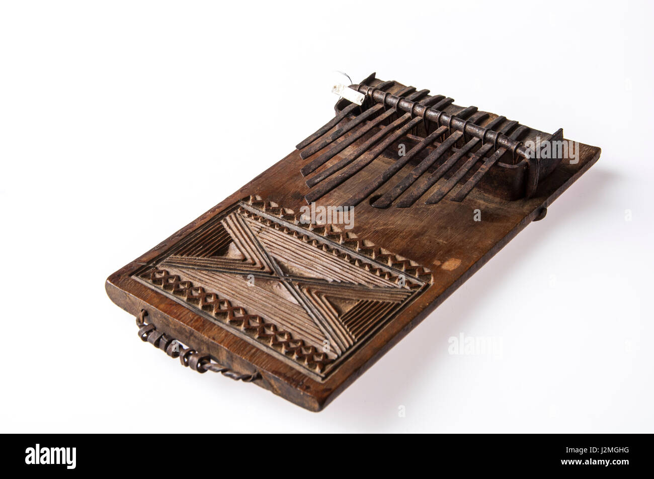 African handmade music instrument isolated on white background Stock ...