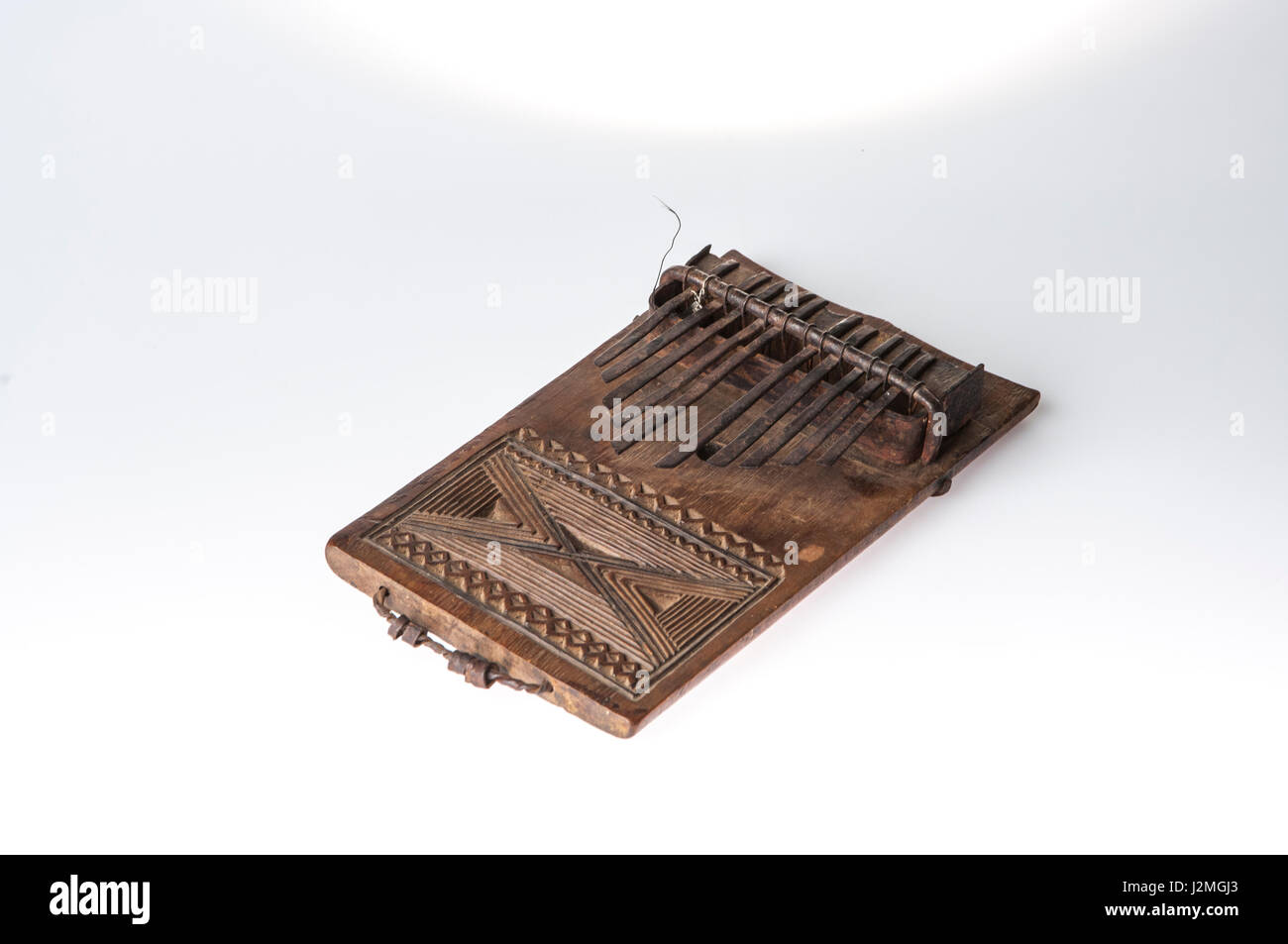 African handmade music instrument isolated on white background Stock ...