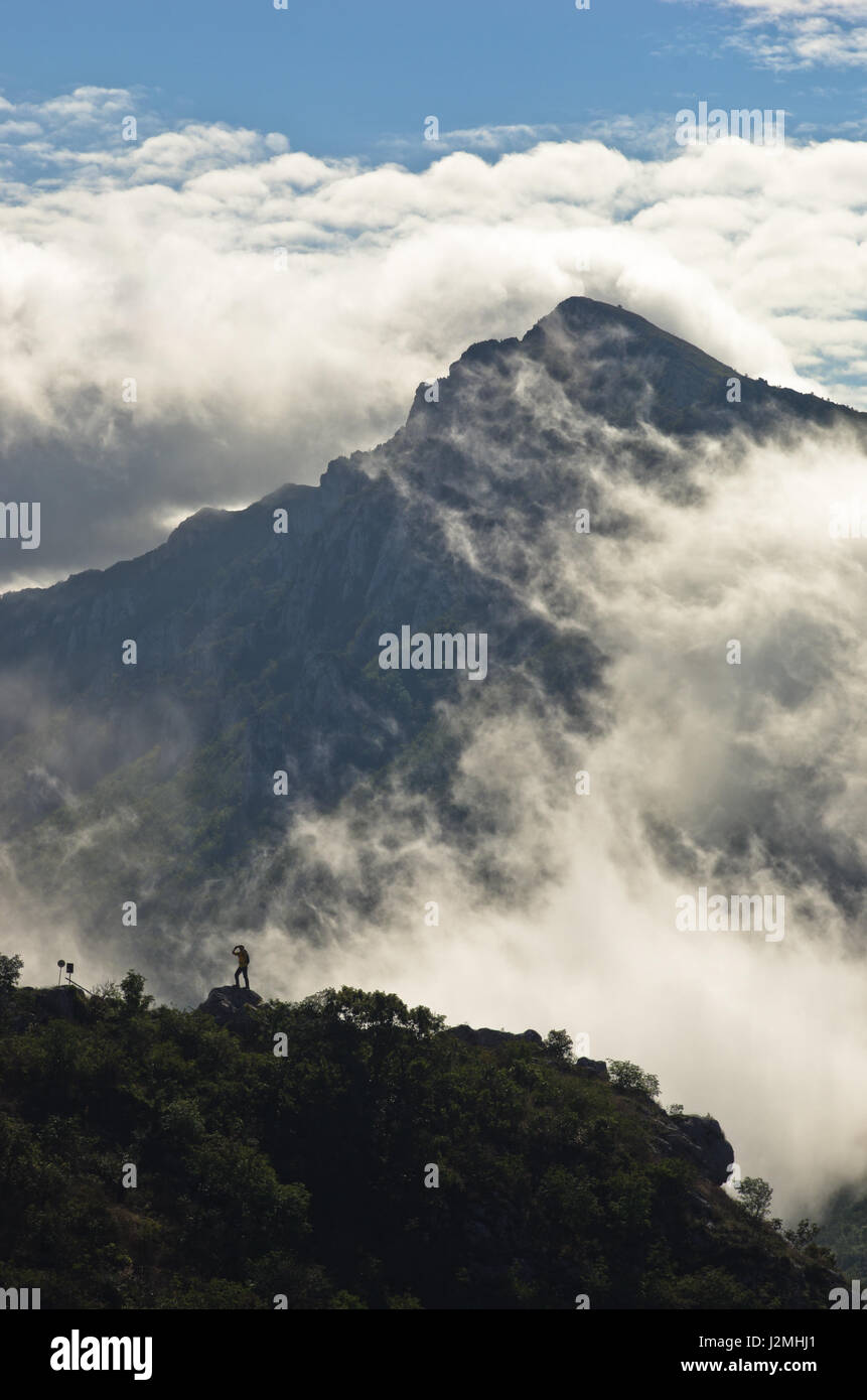 Mountain peaks of Suva Planina at morning covered with clouds in east Serbia Stock Photo