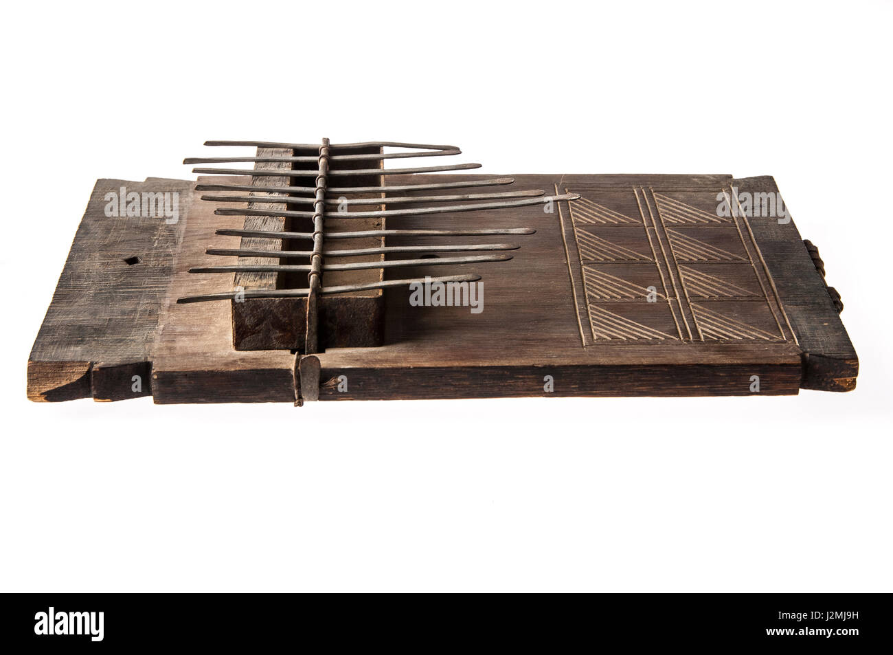 African handmade music instrument isolated on white background Stock ...