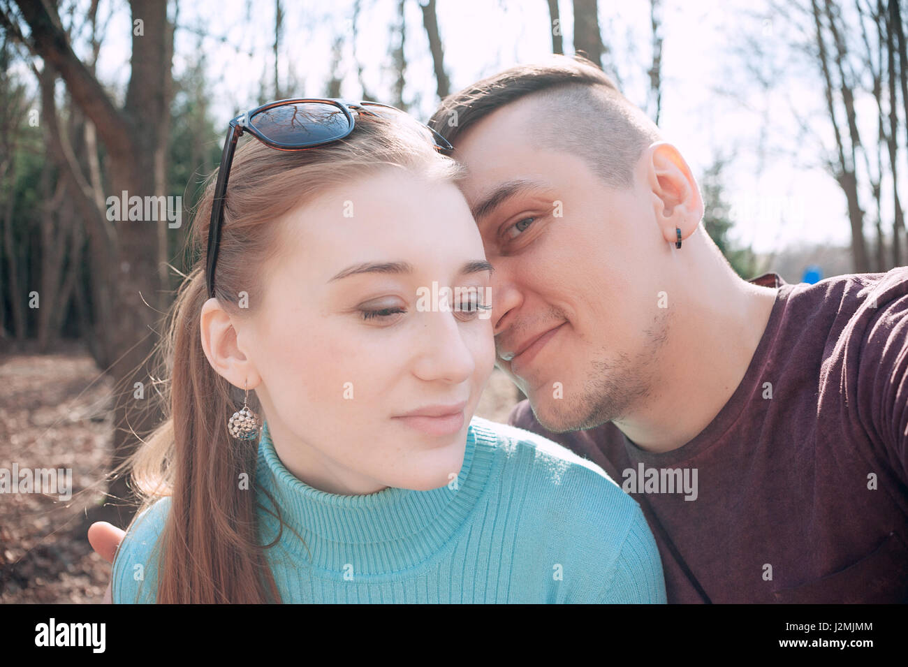 Attractive couple doing selfie outdoors Concept love Stock Photo - Alamy