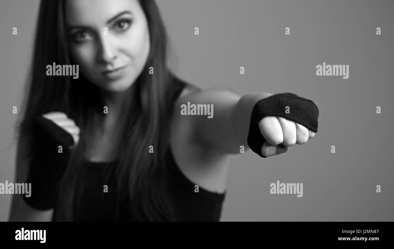 Young boxing woman. Small depth of field Stock Photo