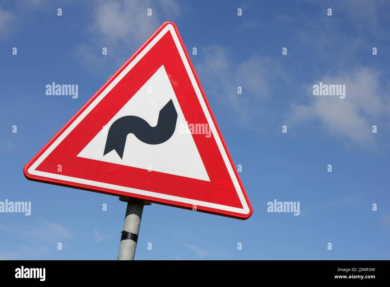 Dutch road sign: double bend Stock Photo