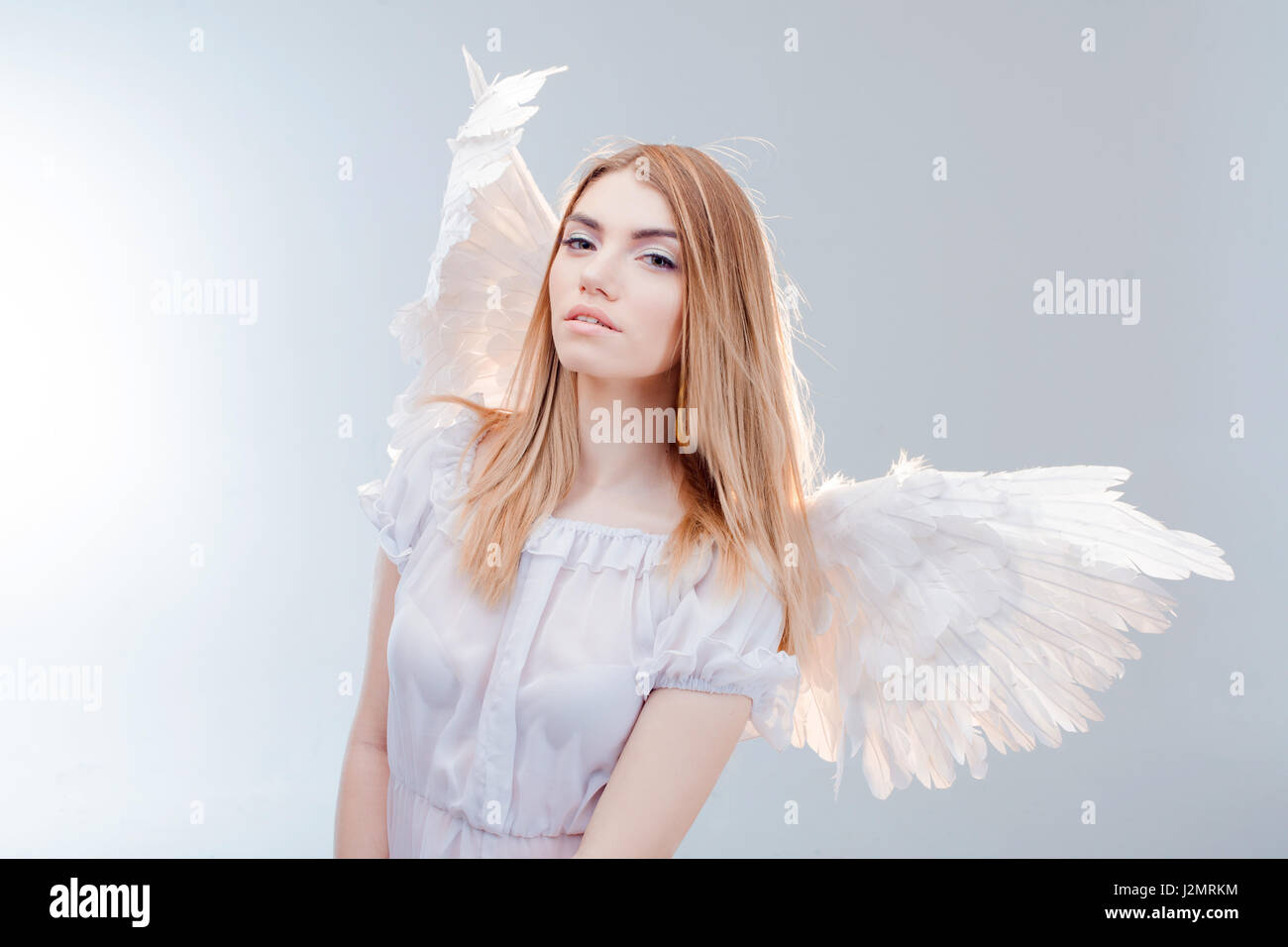 An angel from heaven. Young, wonderful blonde girl in the image of an 