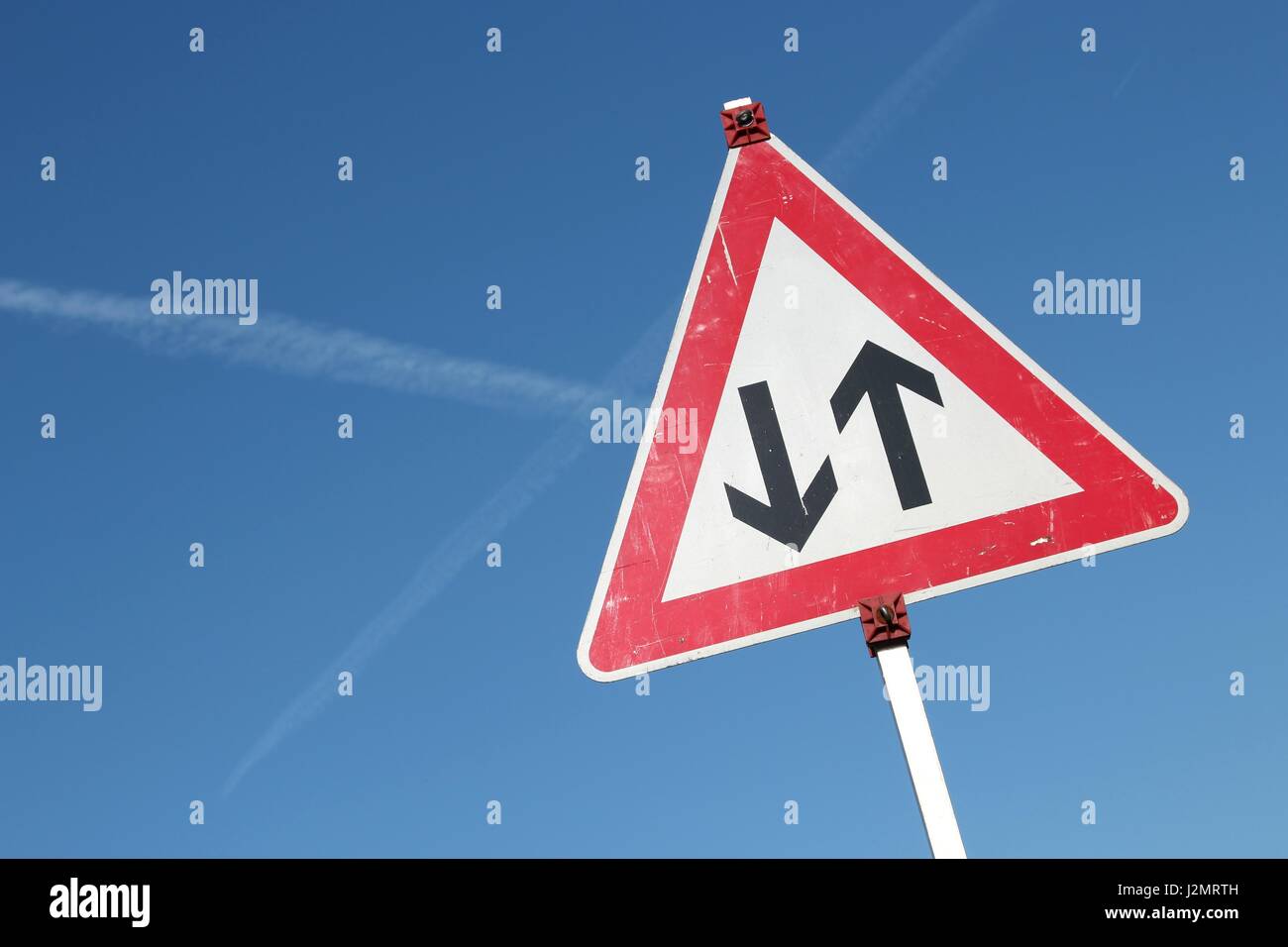 German road sign: two way traffic ahead Stock Photo