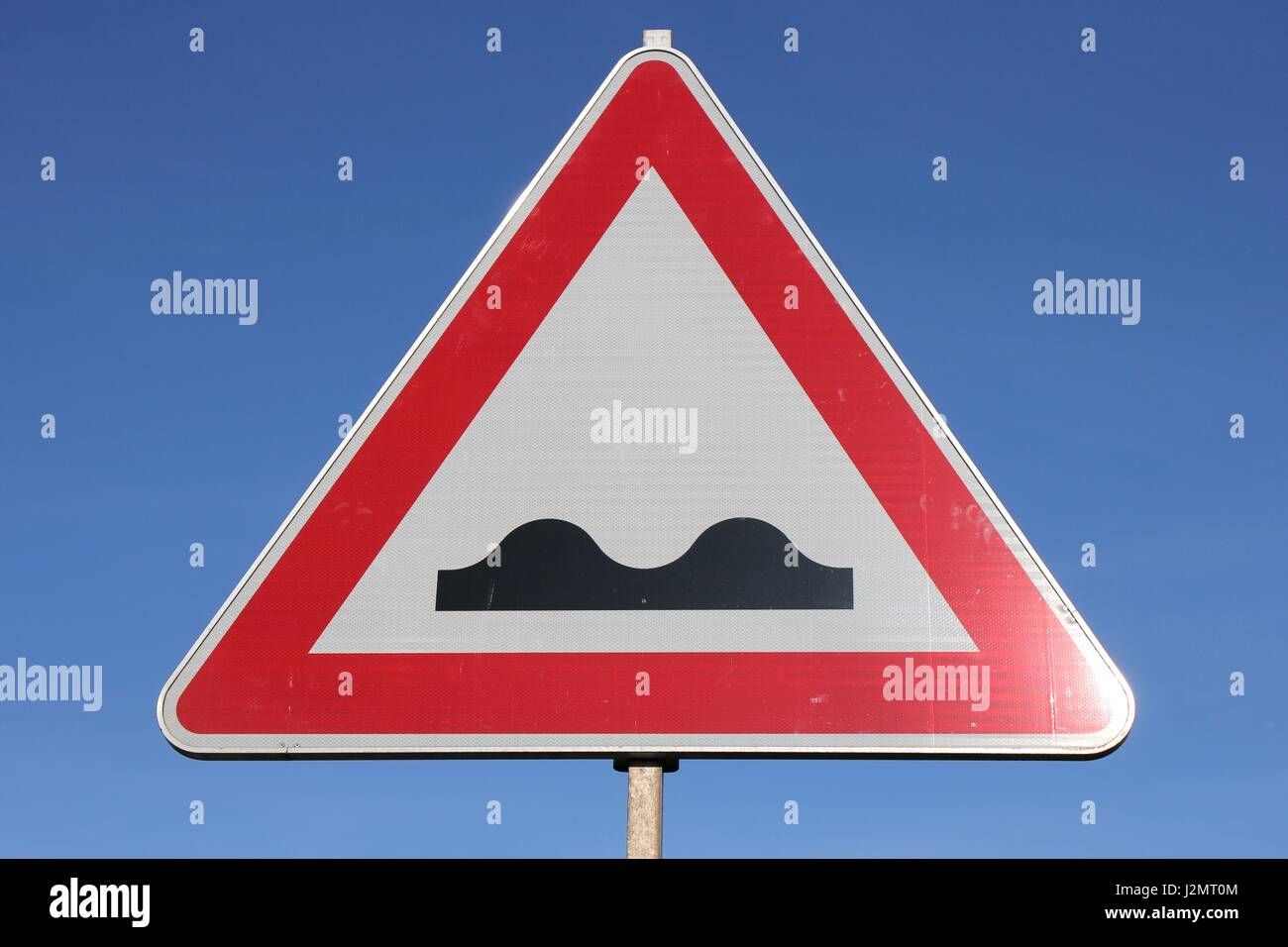 German road sign: bumpy road Stock Photo