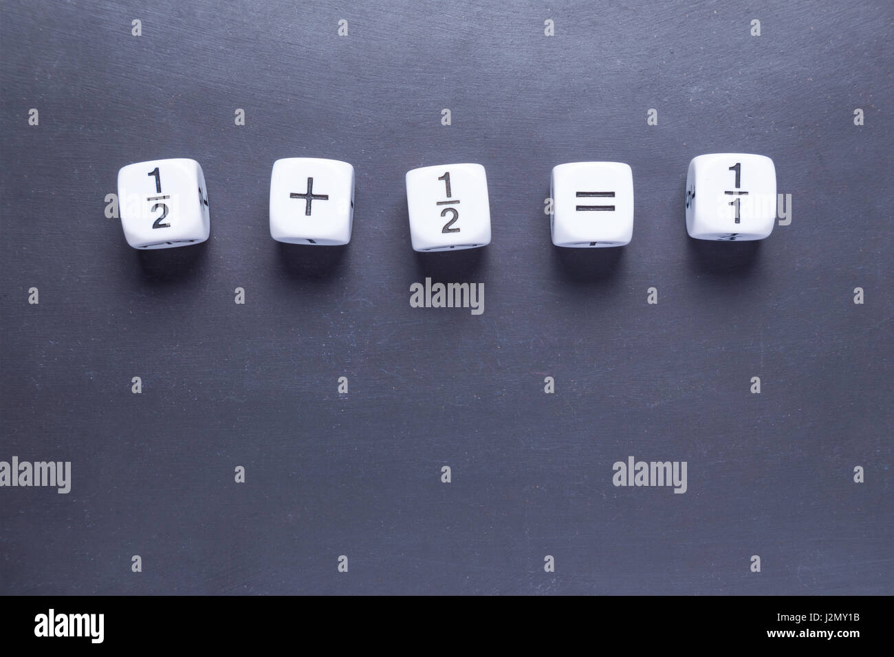 white fraction mah number dices showing simple equation, half plus half