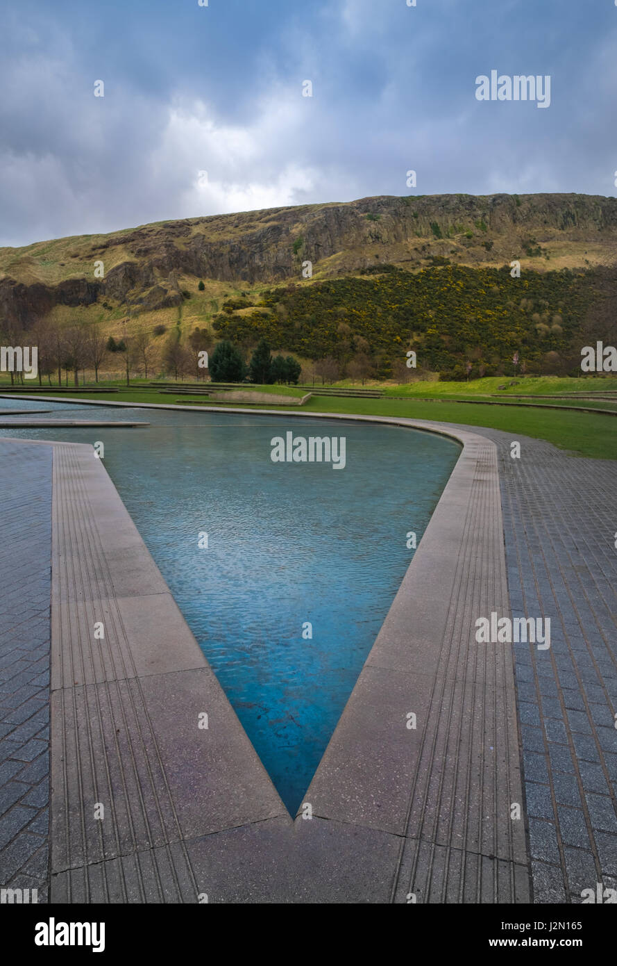 Reflecting pool between the Scottish Parliament building and the iconic ...