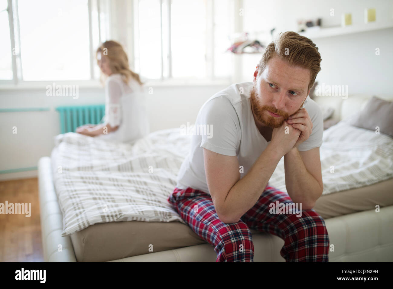 Frustrated couple arguing and having marriage problems Stock Photo