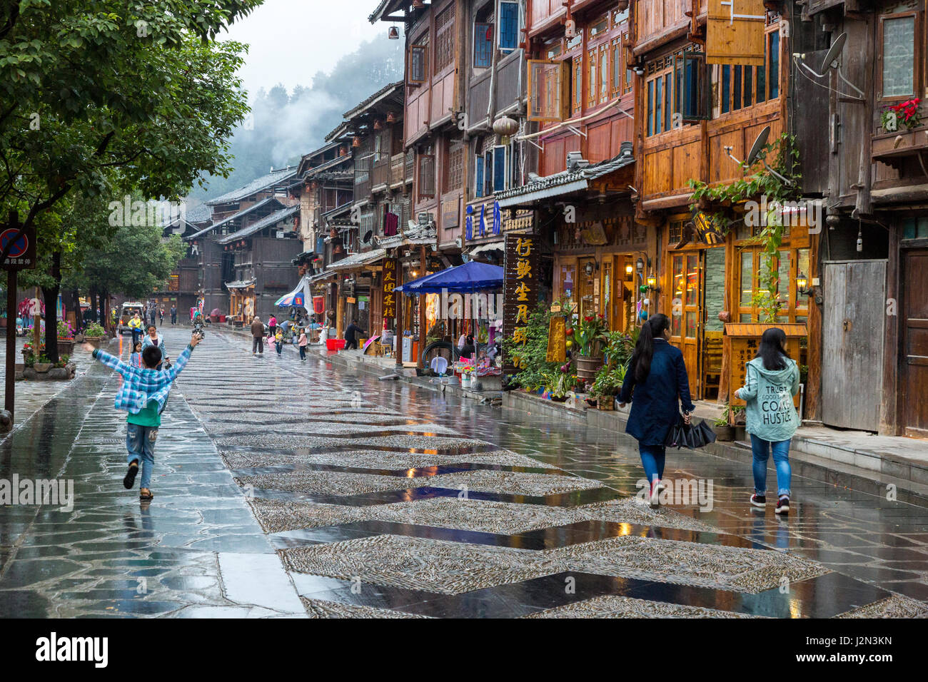 Zhaoxing, Guizhou, China, a Dong Minority Village.  New Street with Shops for Tourists. Stock Photo