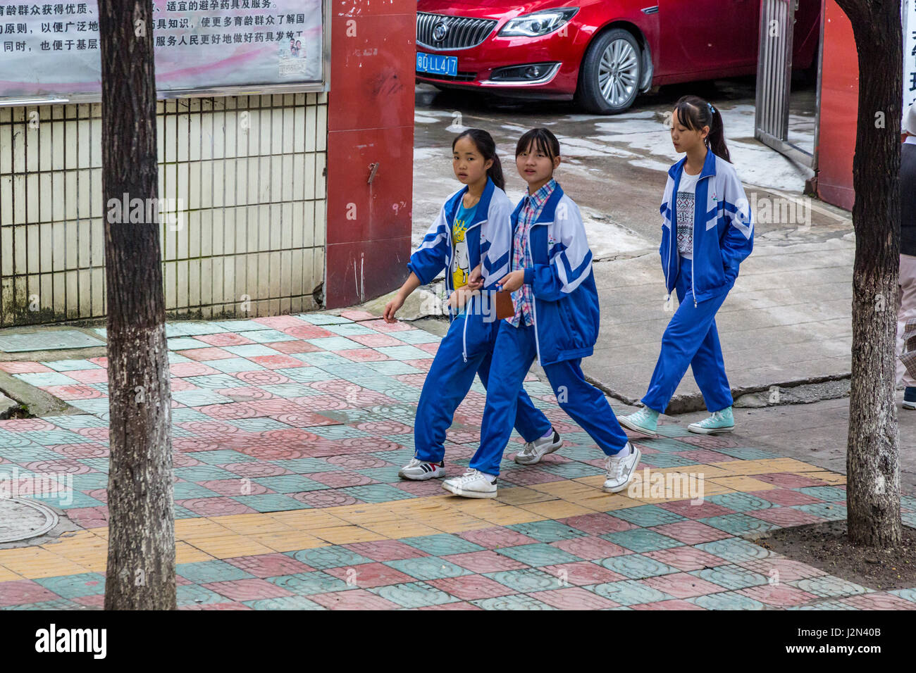 Kaili, Guizhou, China.  Young Women Walking in Sporty Clothes. Stock Photo