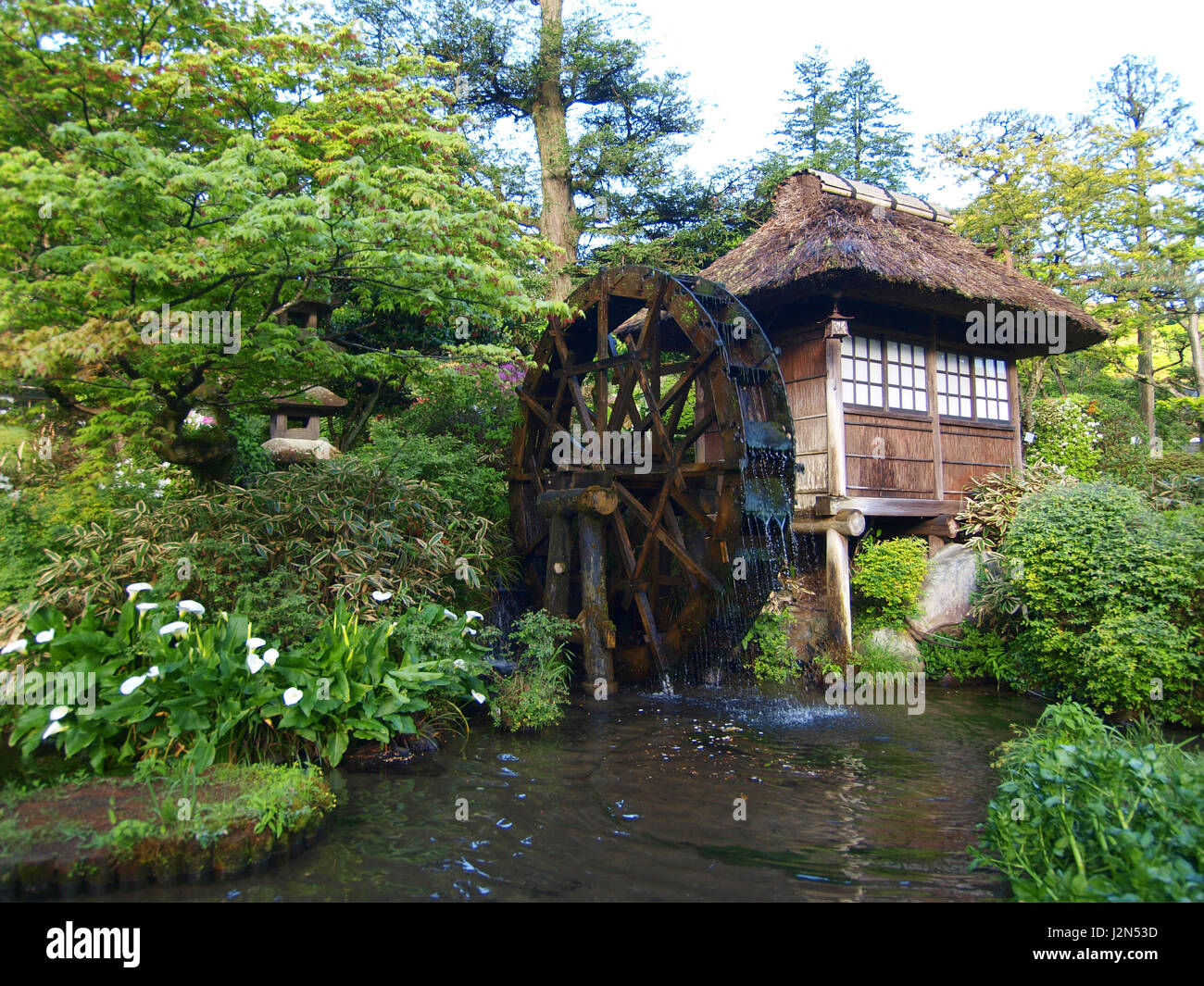 Water mill in japanese garden Stock Photo Alamy