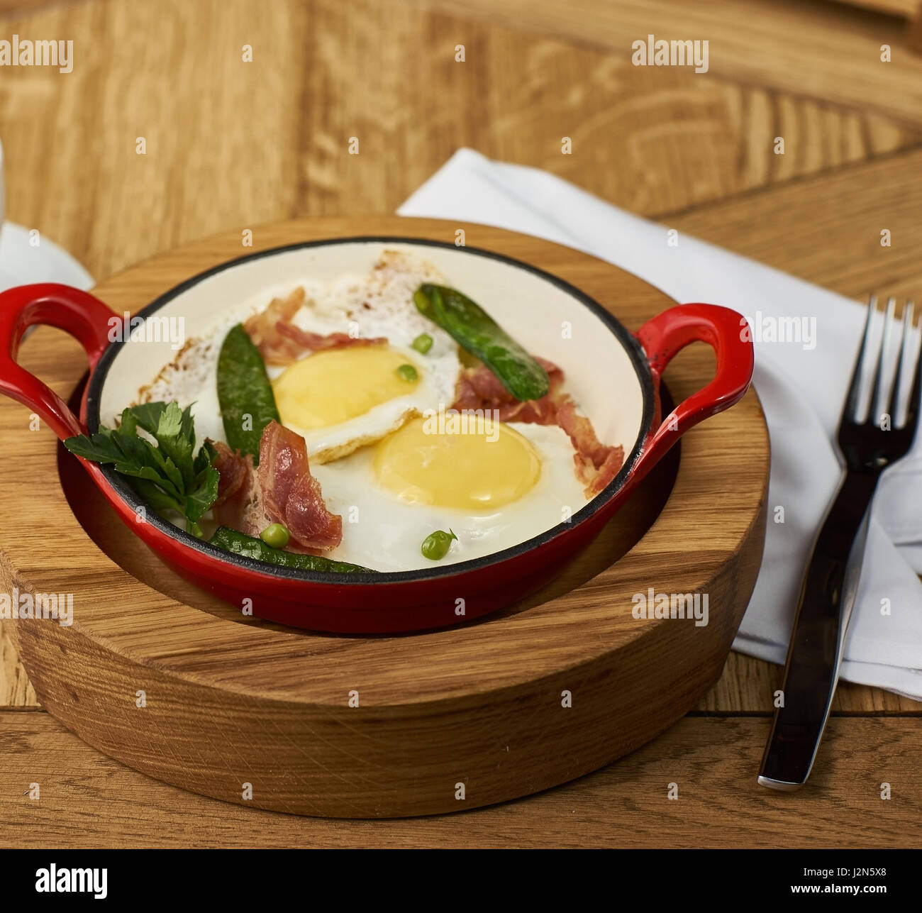 bacon and eggs in restaurant Stock Photo Alamy