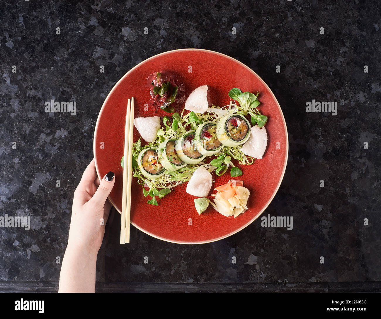 Vegetable sushi rolls with fish Stock Photo - Alamy