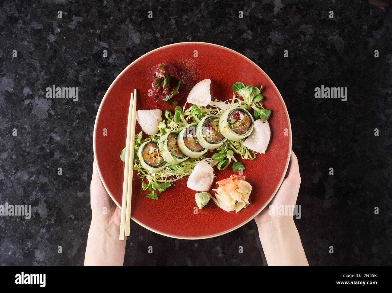 Vegetable sushi rolls with fish Stock Photo - Alamy