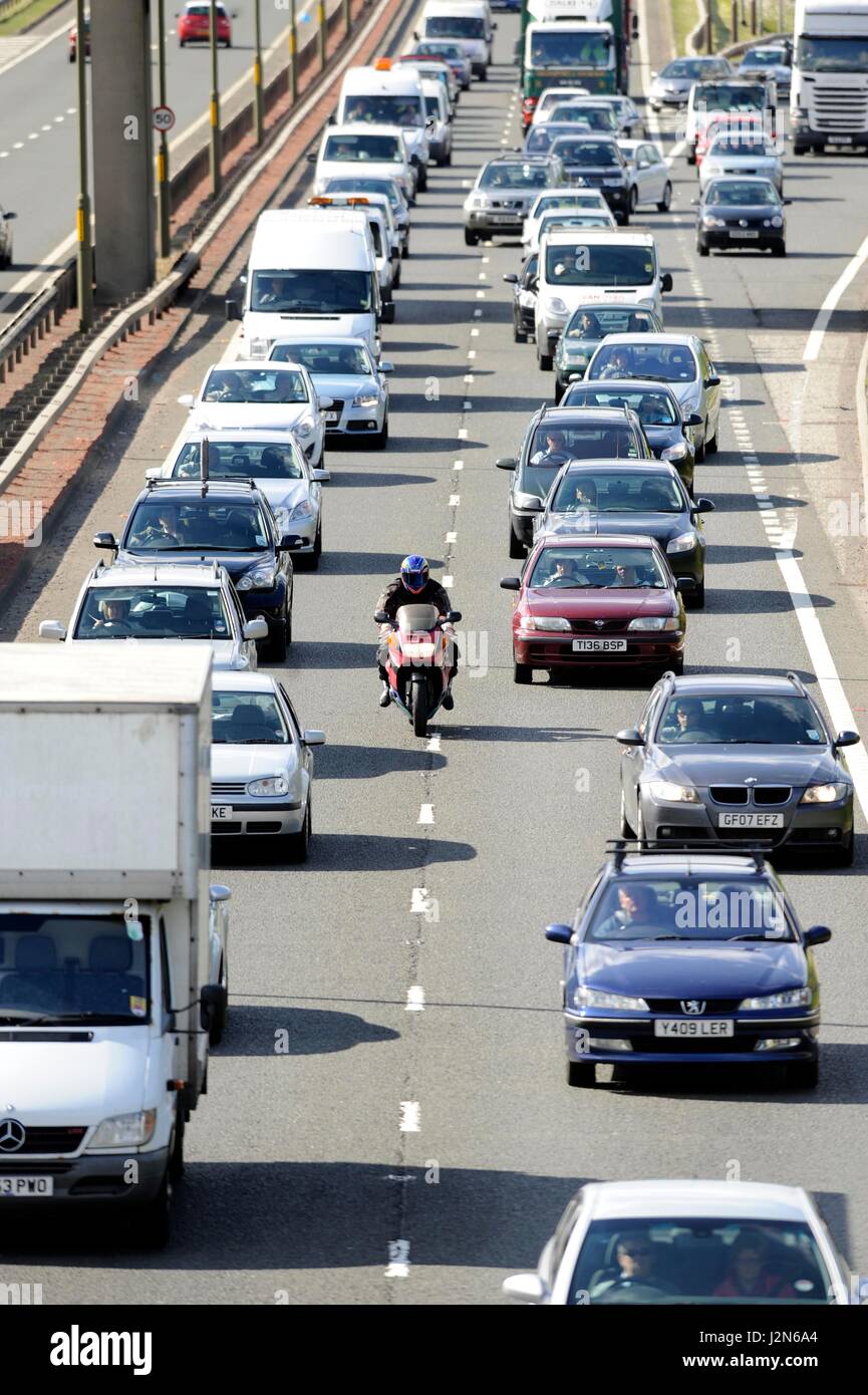 Traffic congestion on the City Bypass as seen from the bridge on the round-a-bout at the end of the Calder Ro Stock Photo