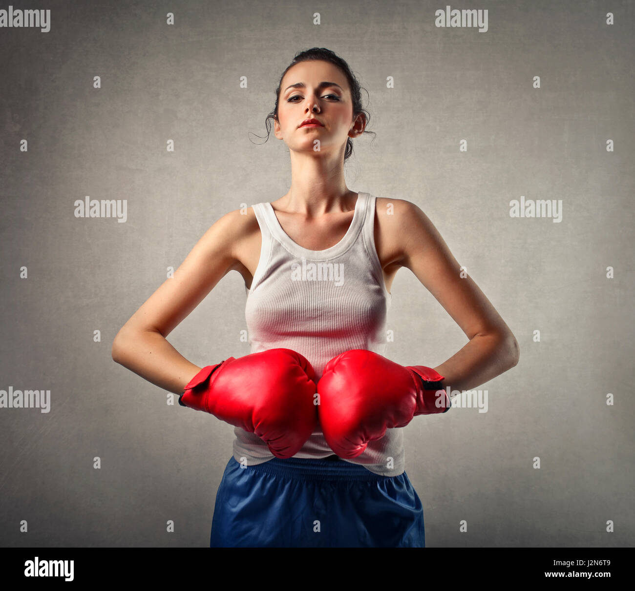 Skinny woman with boxing gloves Stock Photo Alamy