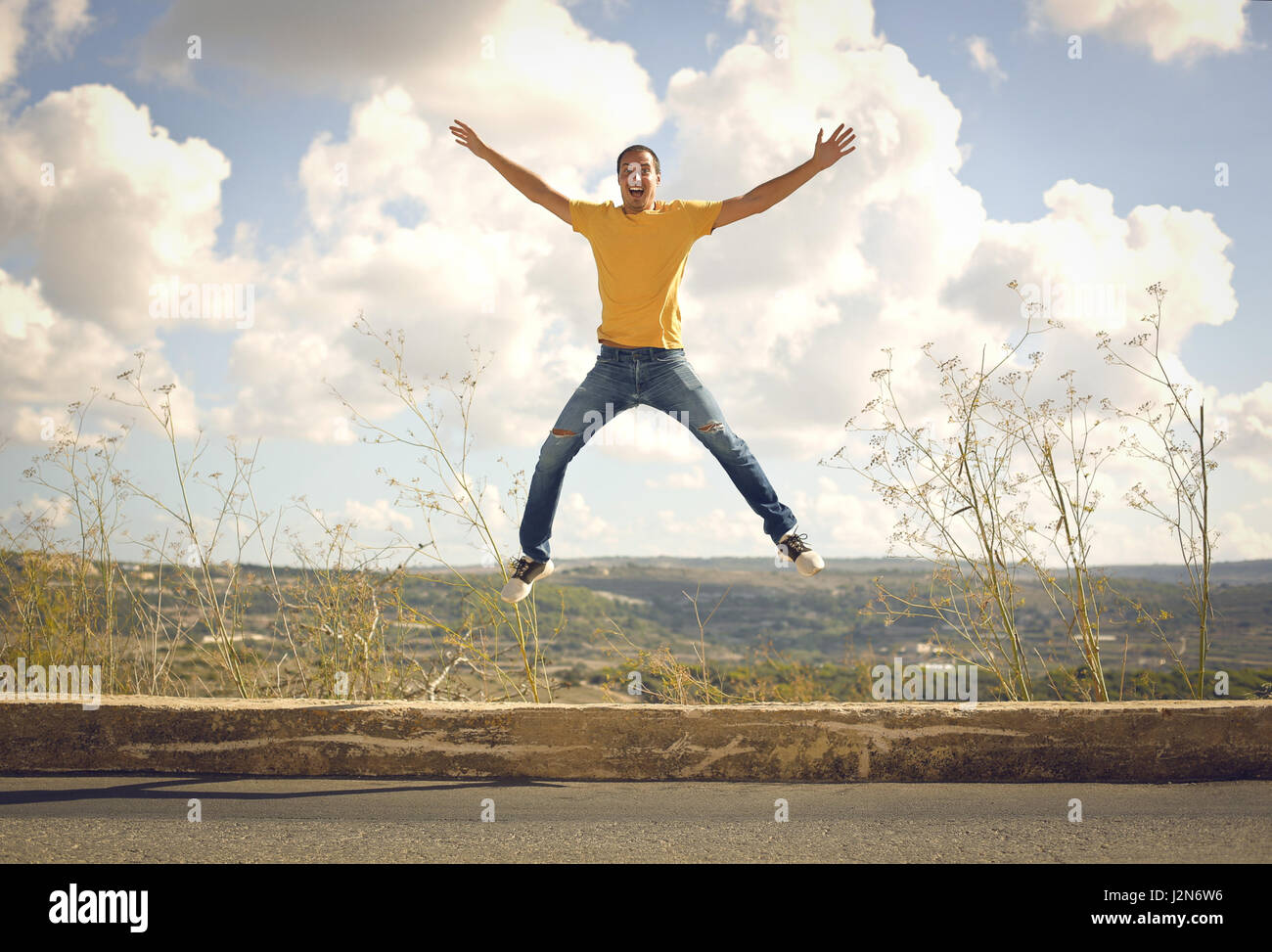 Man jumping outside Stock Photo