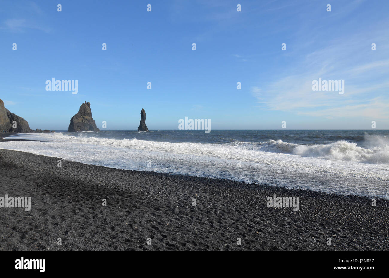 reynisdrangar sea stacks off the shore of Reynisfjara beach in Vik ...