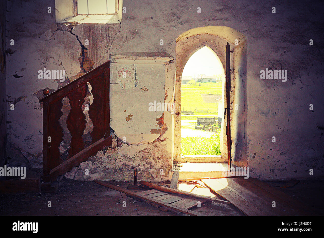 interior of abandoned old gothic church, damage on walls Stock Photo