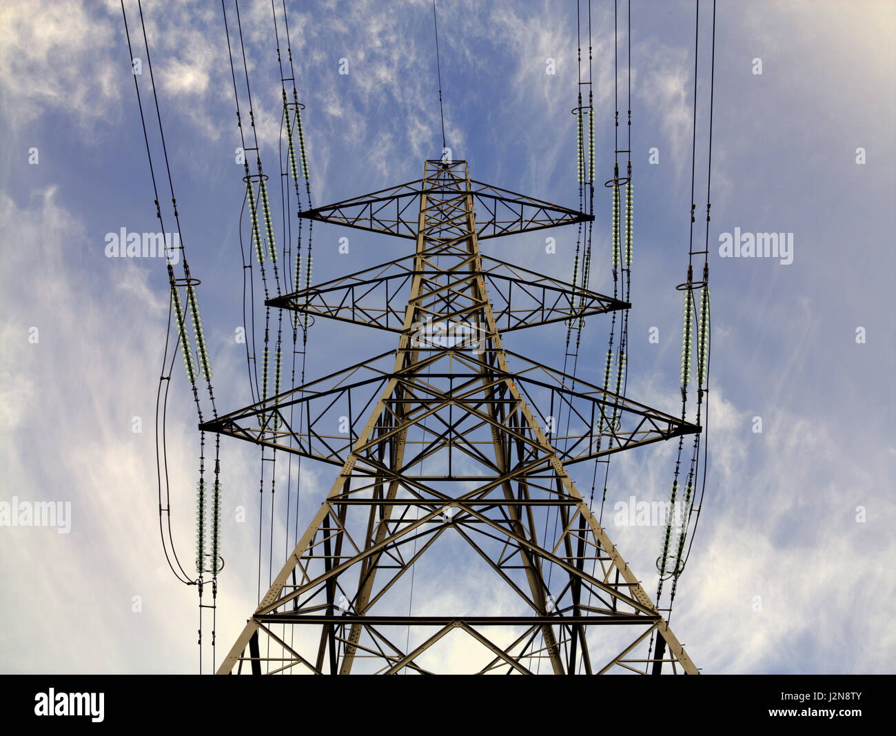 electricity pylon blue cloudy sky Stock Photo