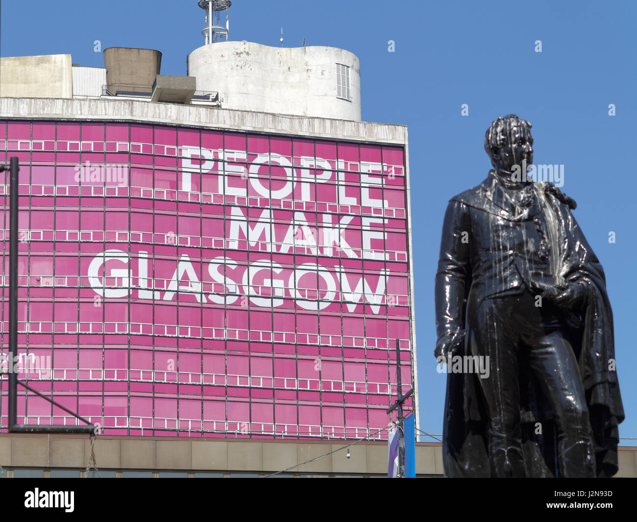 People Make Glasgow George Square sunny day blue sky statue of the poet Thomas Campbell Stock Photo