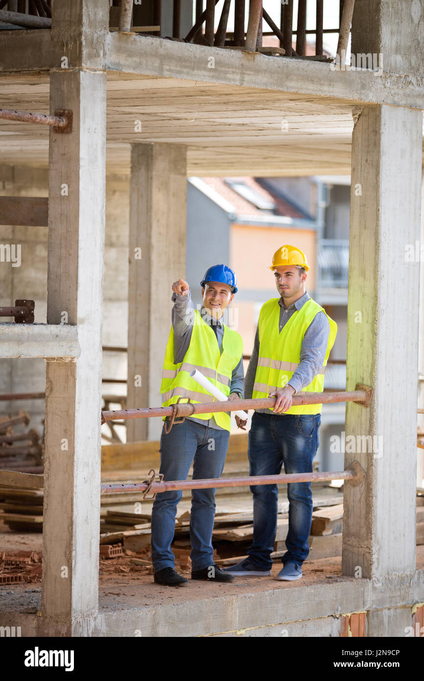 Male architect and his partner planning future building Stock Photo Alamy