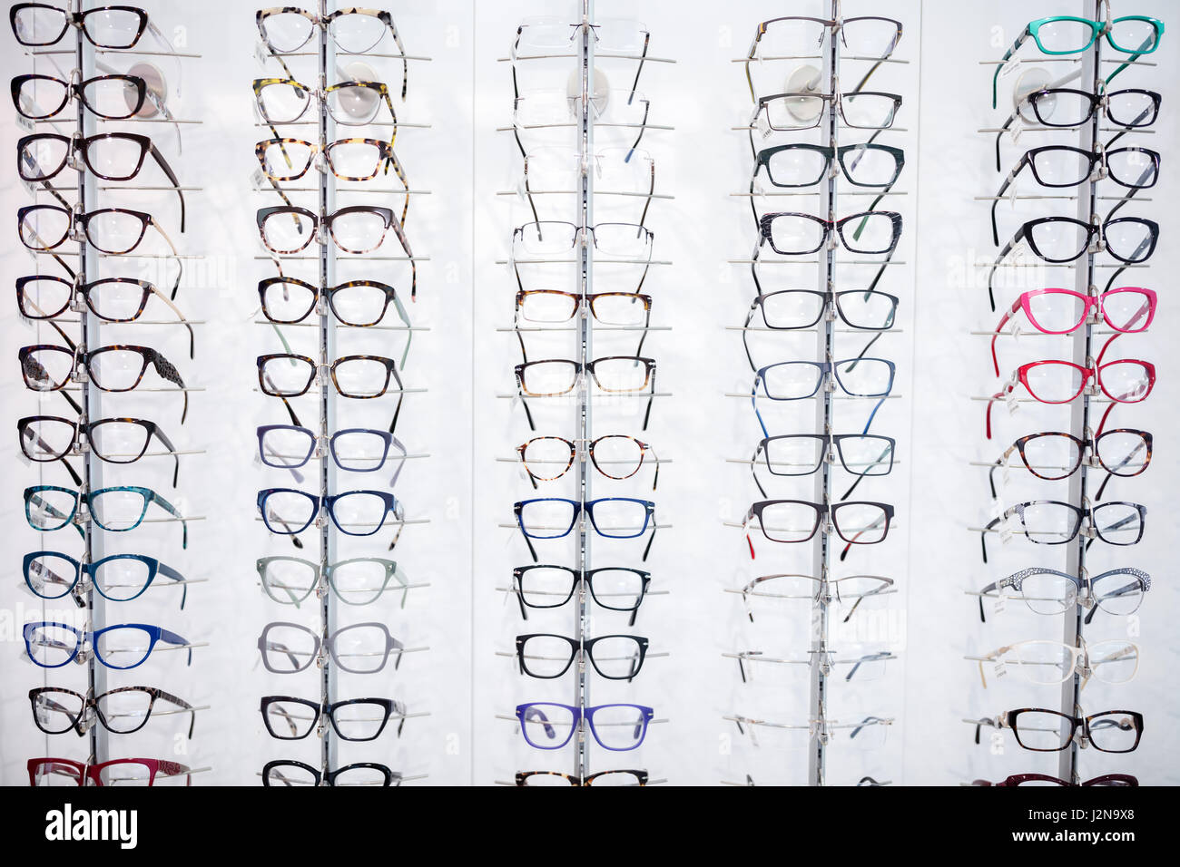 In eyewear shop can be seen large selection of frames for eyeglasses Stock Photo