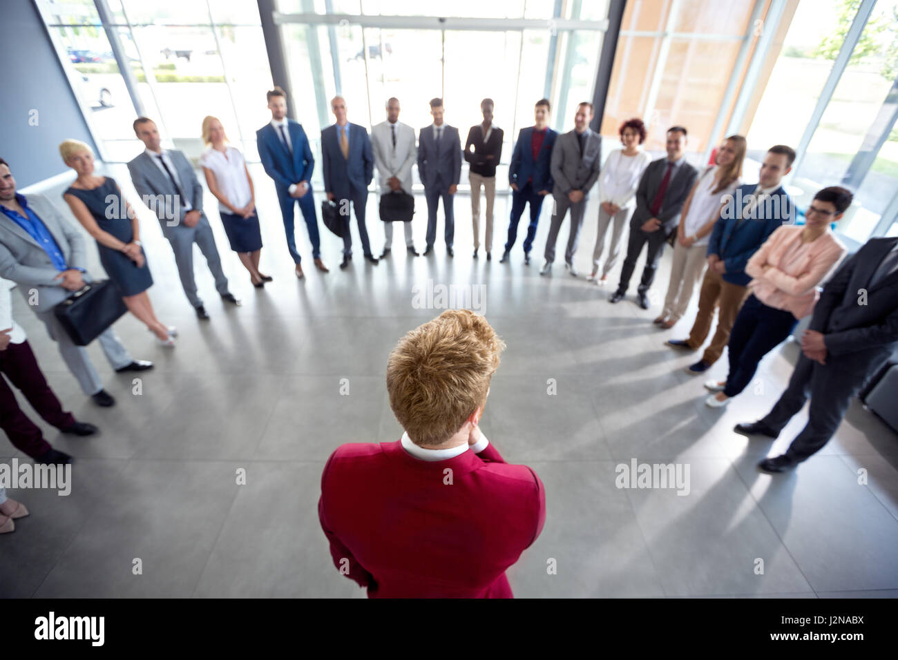 Leader encourage his team and congratulate them on success Stock Photo