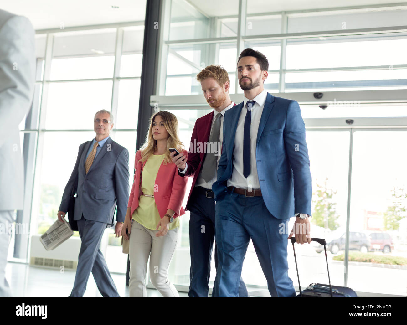 Young businessmen travel to work Stock Photo - Alamy