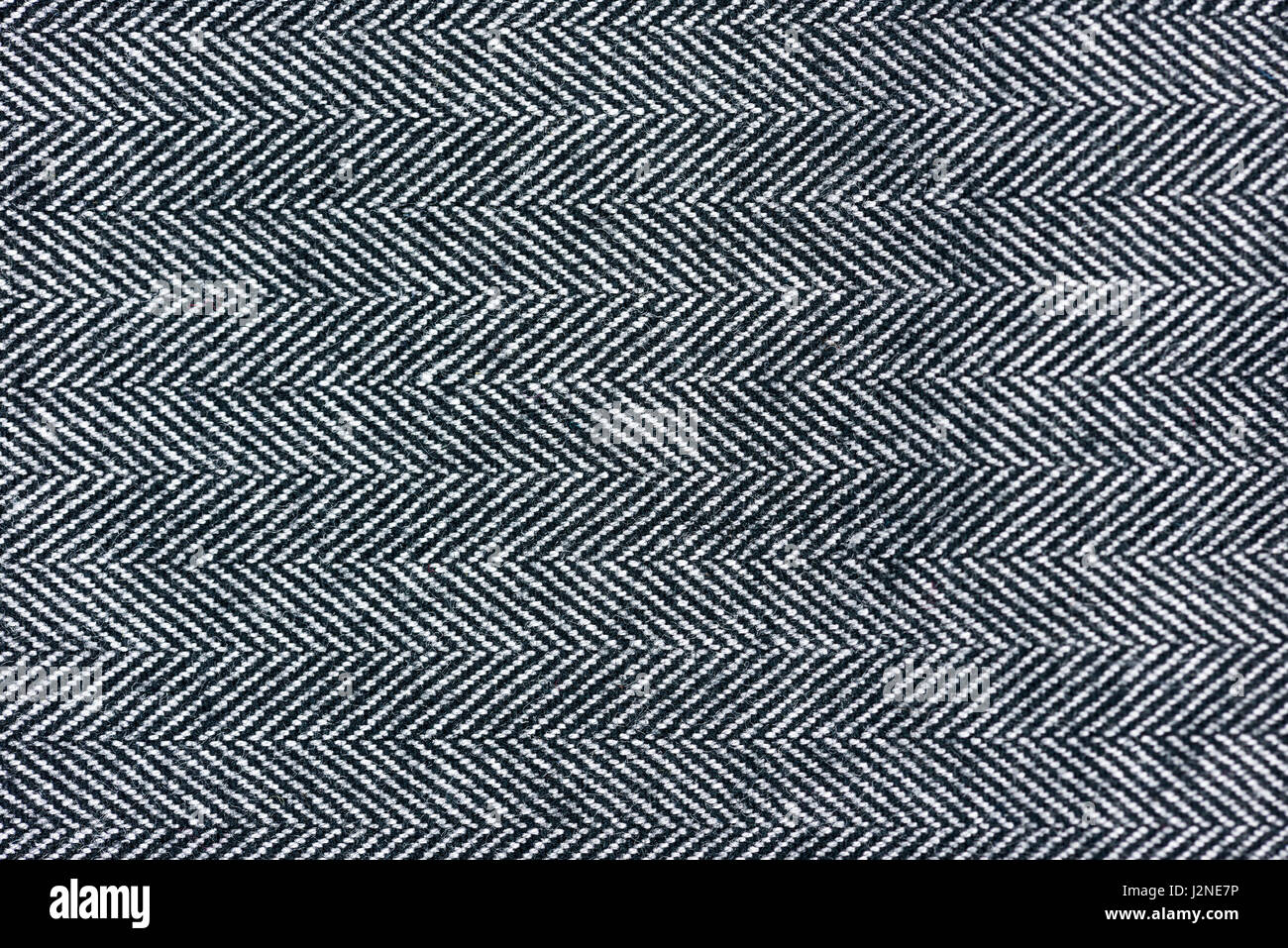 CloseUp of a gray herringbone fabric pattern for background pur Stock