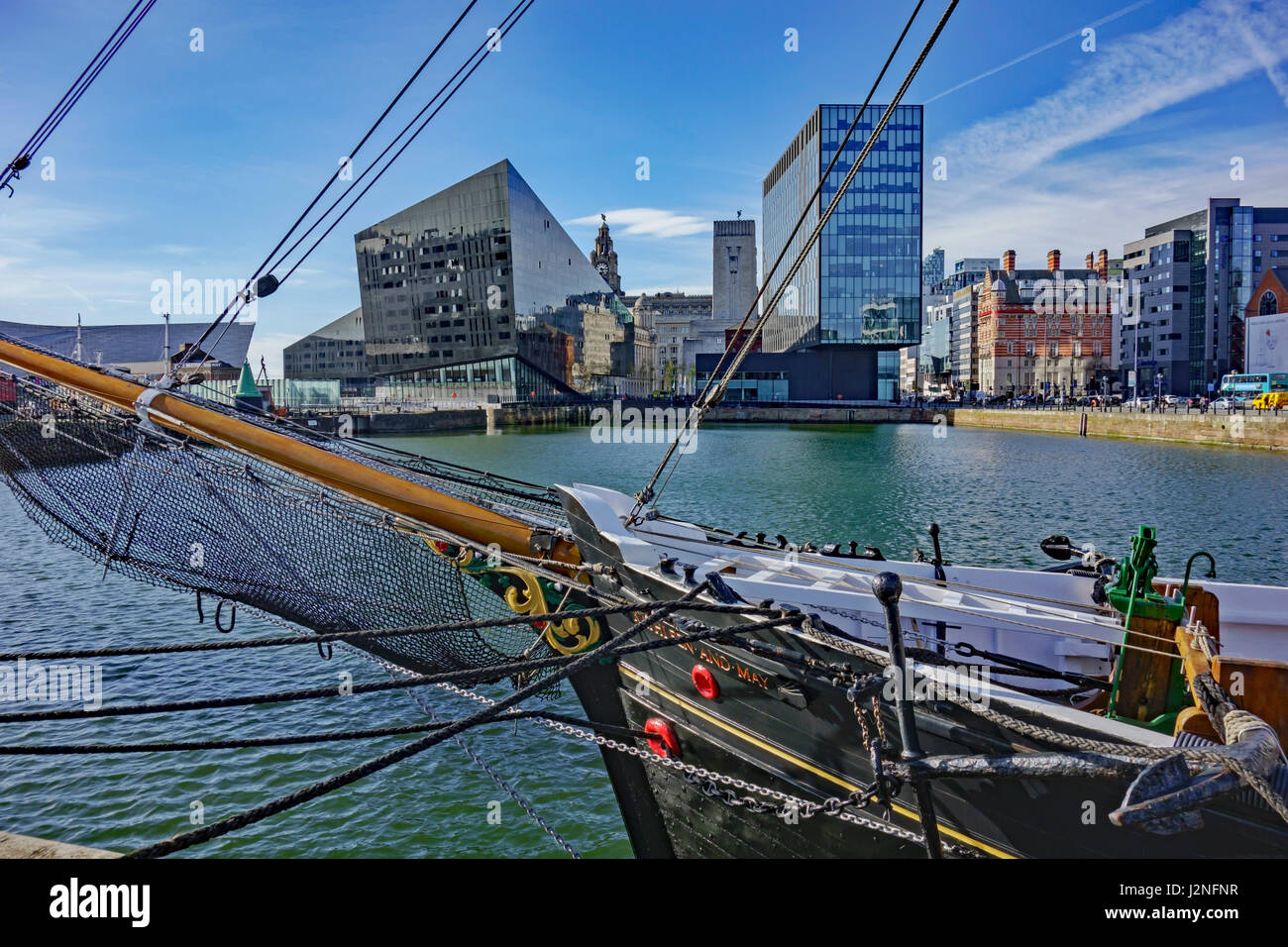 Sailing ship in Canning Dock, Liverpool with view of modern buildings Stock Photo