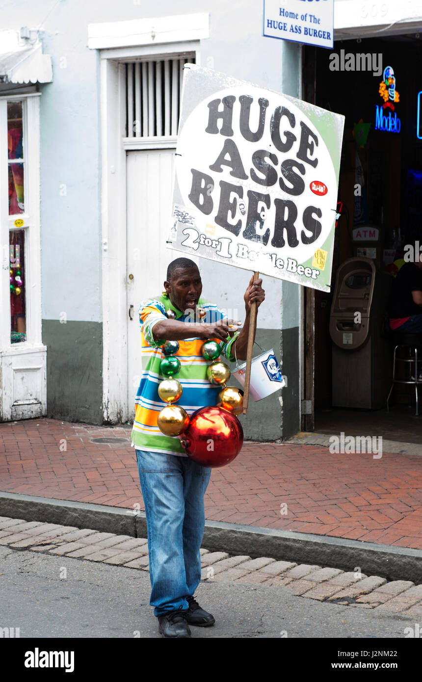 April 29, 2017 A beer vendor performs outside his shop on Bourbon