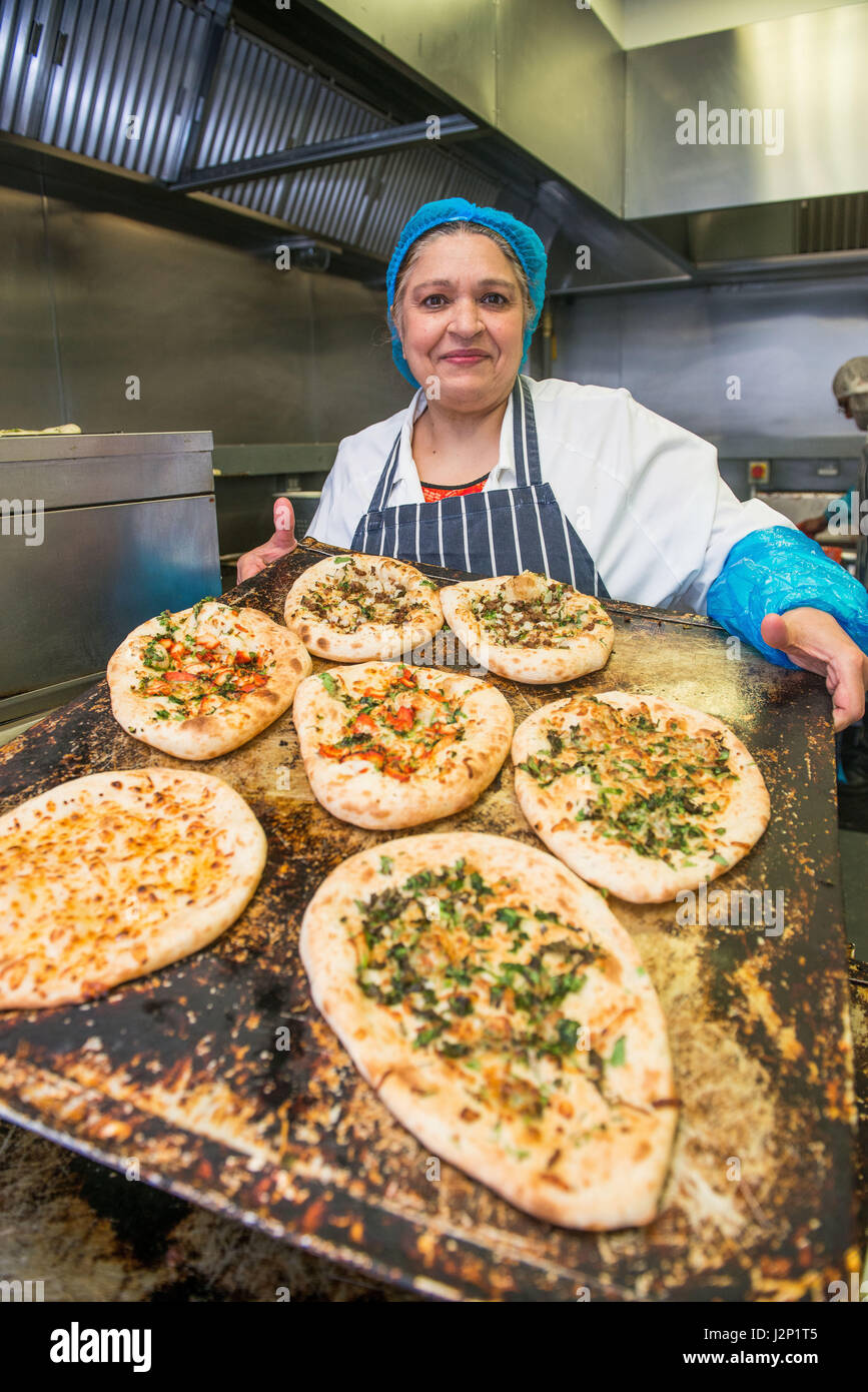 Mrs Unis introduces a new range of Naan bread exlusive to Asda supermarkets, Mrs Unis with Asda regional buyi Stock Photo