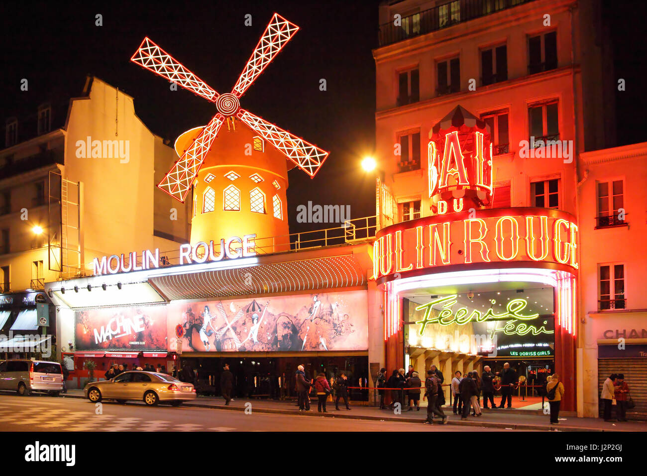 Paris, France - March 04, 2011:  The Moulin Rouge (Red Mill) cabaret at night in Paris, France Stock Photo