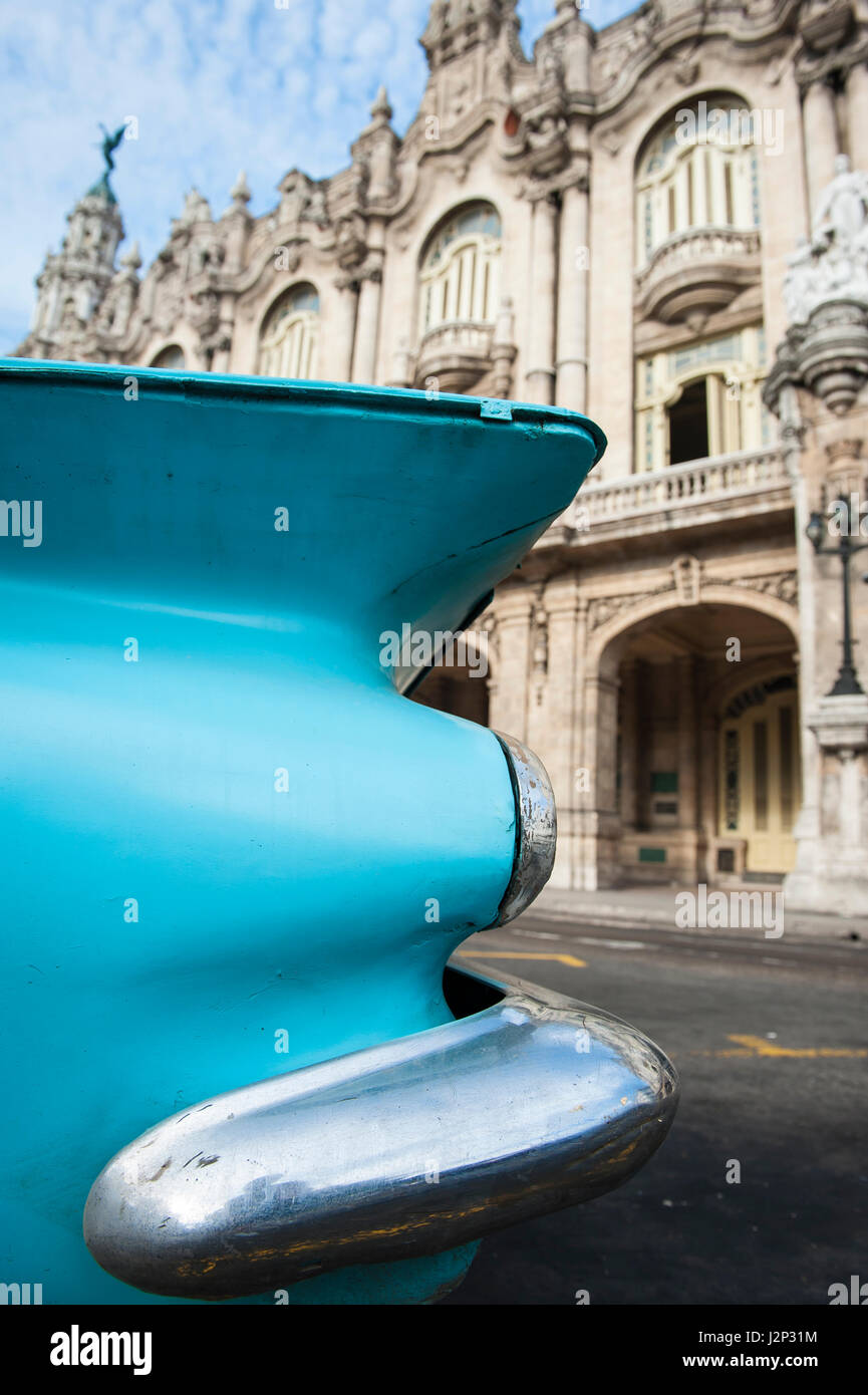 Detail close up of the tail fin of a classic American car parked in front of the Great Theatre of Havana, in Cuba Stock Photo
