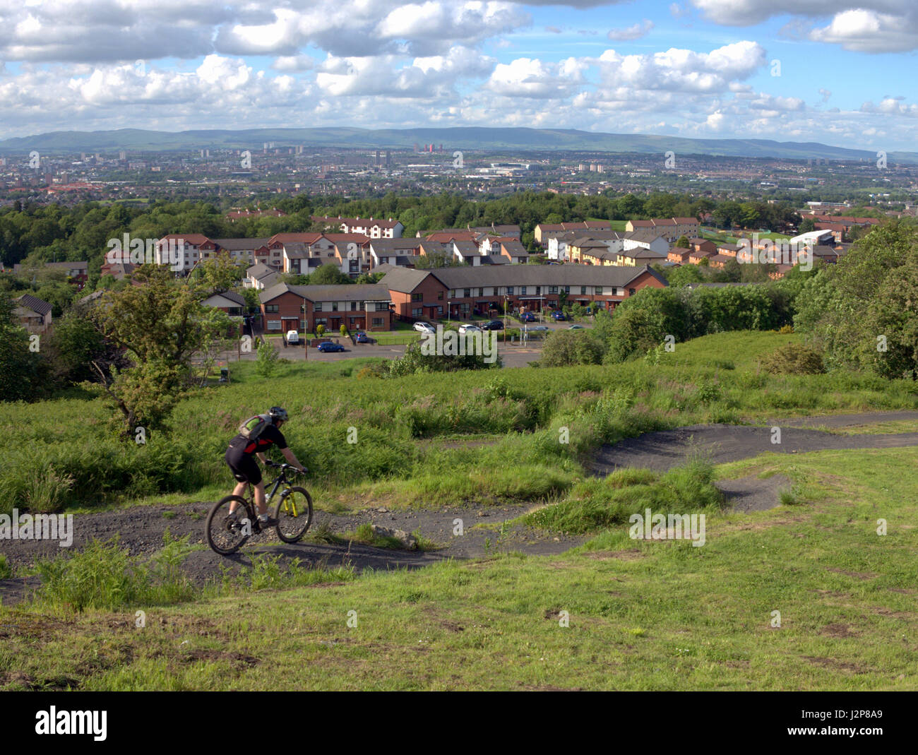 Cathkin Braes Country Park and mountain biking centre with panorama of Castlemilk and Glasgow Stock Photo