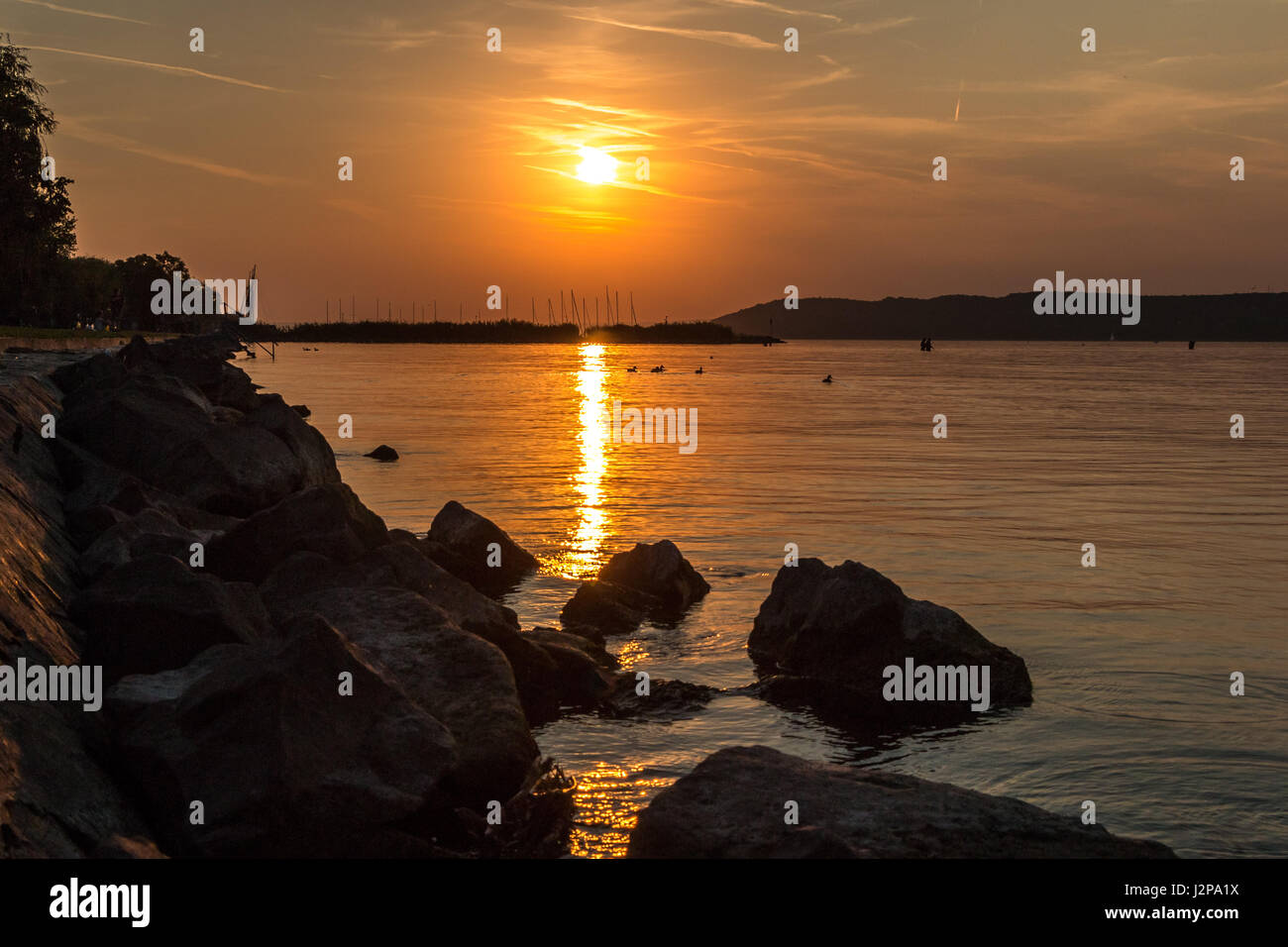 Sunset over Lake Balaton in Zamardi, Hungary Stock Photo - Alamy
