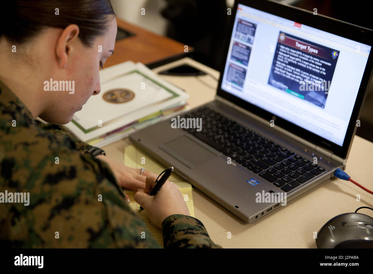 A U.S. Marine assigned to Marine Corps Intelligence Schools, Navy and