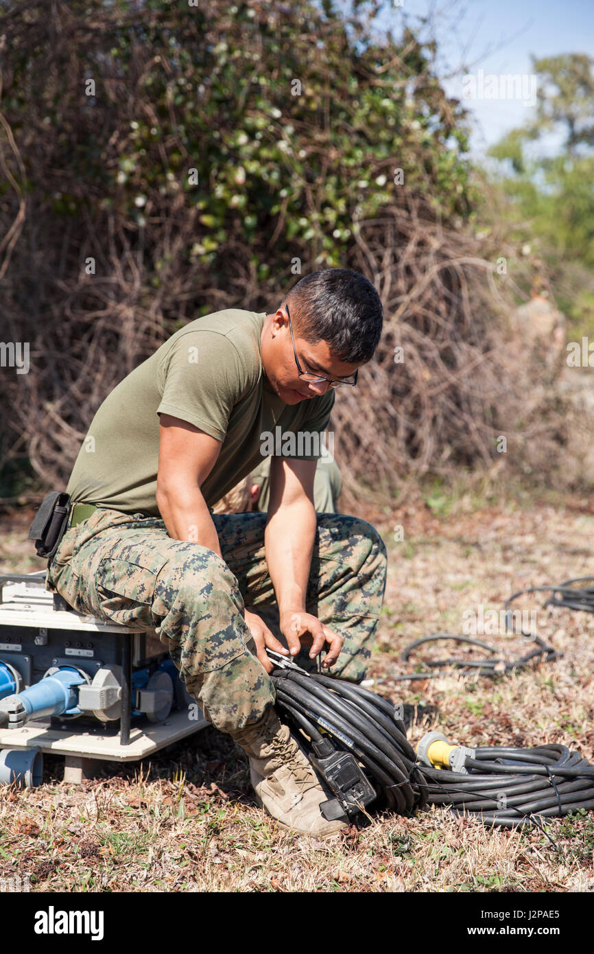U.S. Marine Corps Lance Cpl. I. Hernandez, an electrician
